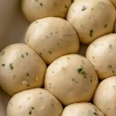 Garlic Bread Rolls 1 Freshly baked garlic bread rolls served warm with herb butter.