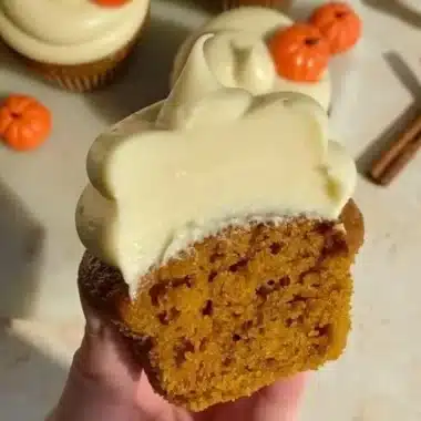 Homemade Pumpkin Cupcakes 2 Homemade pumpkin cupcakes with cream frosting and autumn decorations
