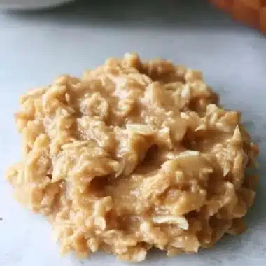 No Bake Peanut Butter Coconut Cookies 2 No bake peanut butter coconut cookies stacked on a plate