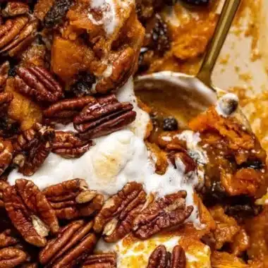 Southern Maple Sweet Potato Casserole 1 Southern Maple Sweet Potato Casserole topped with pecans and marshmallows