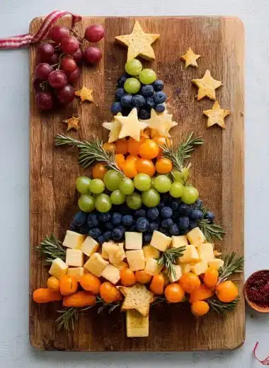Christmas tree shaped charcuterie board with assorted meats and cheeses