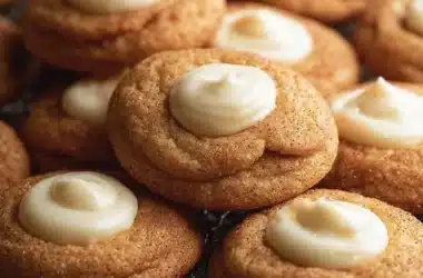 Eggnog Snickerdoodle Thumbprint Cookies on a decorated plate