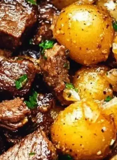 Delicious Garlic Butter Beef Bites served with tender potatoes